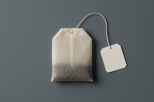 Simple tea bag on slate background